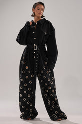 PLAY YOUR CARDS RIGHT DENIM JUMPSUIT WITH GROMMETS