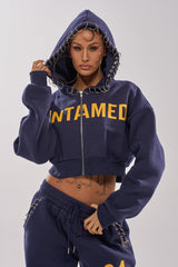 UNTAMED METAL RING SWEATSHIRT